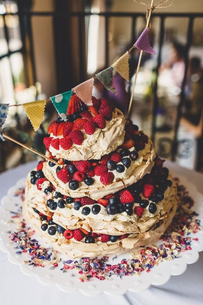 The 'Pavlova stack cake' with festoons as caketopper
