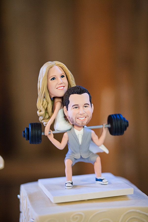 The Gym Man with Bride on Shoulder Cake Topper
