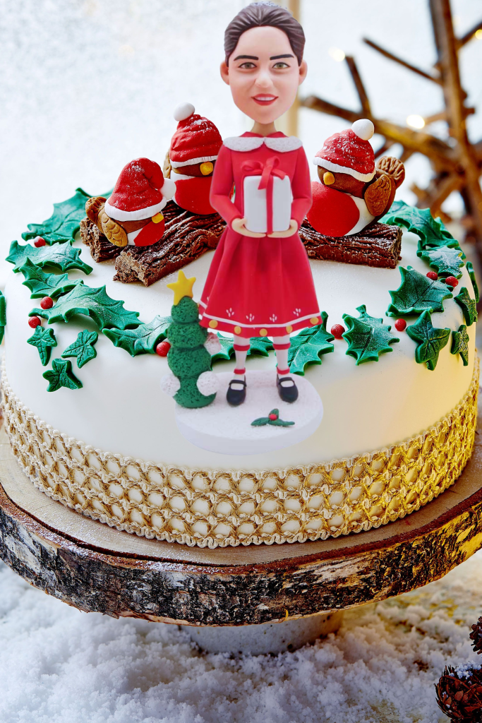 lady with Christmas gifts Cake Topper