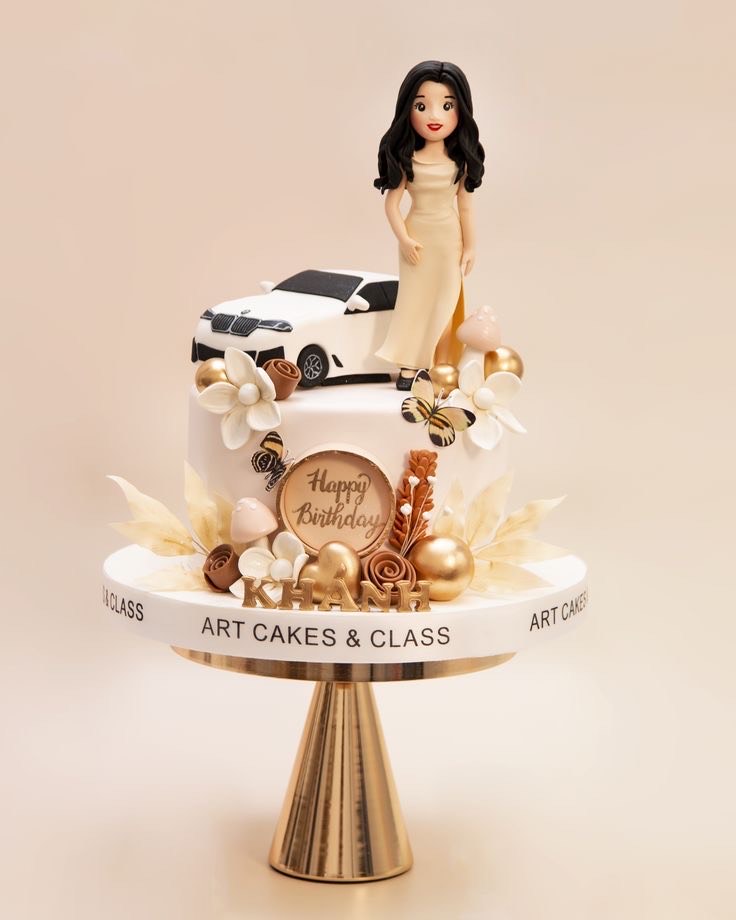 Mini figurine of 'her' with accessories of car and edible flowers